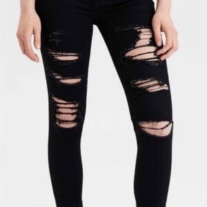 American Eagle - Next level stretch, ripped, ankle length jeans. Size 2